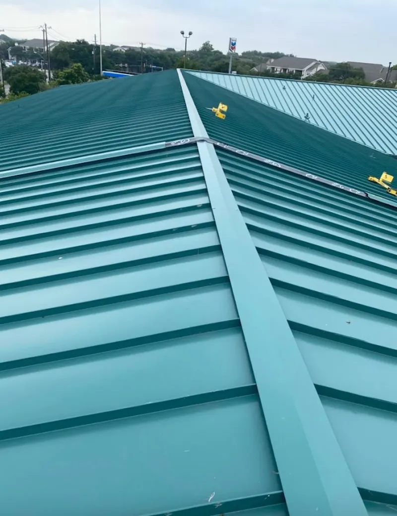 Green commercial metal roof ridge and valley for Metal Roof Repair in Springfield